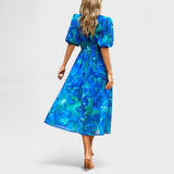 Clara – Virágmintás Elegáns Ruha